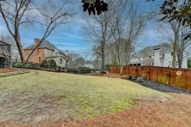 view of yard featuring fence