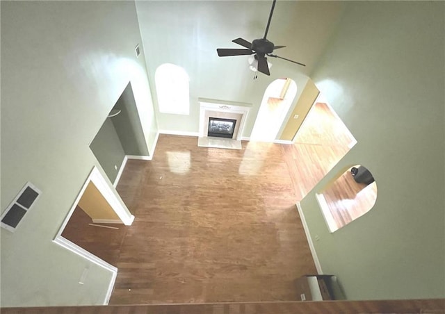 2280 Hickory Station Cir, Snellville, GA 30078 - unfurnished living room featuring a towering ceiling and ceiling fan