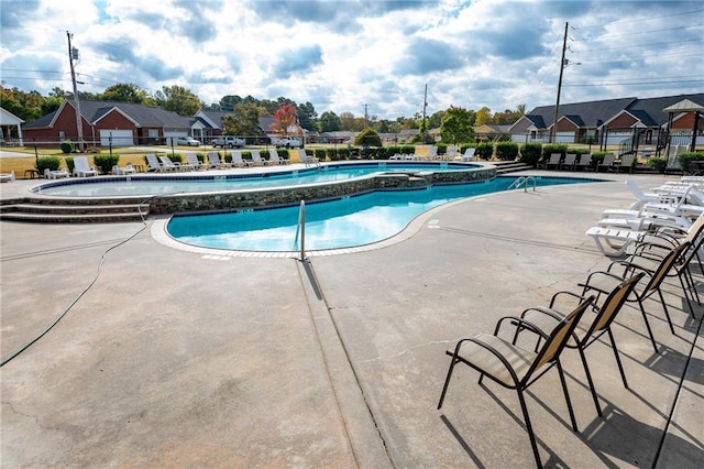 view of pool featuring a patio