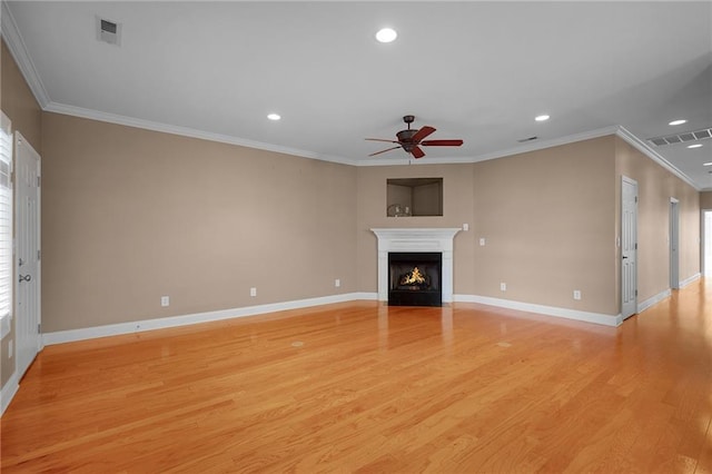 unfurnished living room with ceiling fan, light wood-type flooring, and crown molding