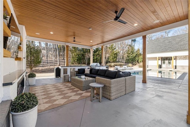 view of patio / terrace featuring an outdoor living space and ceiling fan