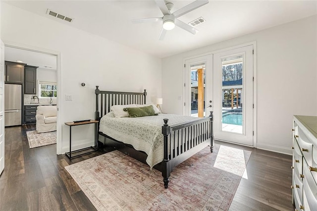 bedroom featuring stainless steel refrigerator, ceiling fan, dark hardwood / wood-style flooring, access to outside, and french doors