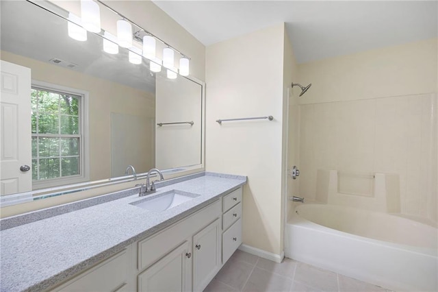 3684 Regent Dr NW, Kennesaw, GA 30144 - full bath with tile patterned flooring, shower / washtub combination, vanity, and baseboards