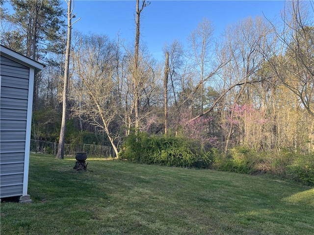 view of yard featuring fence