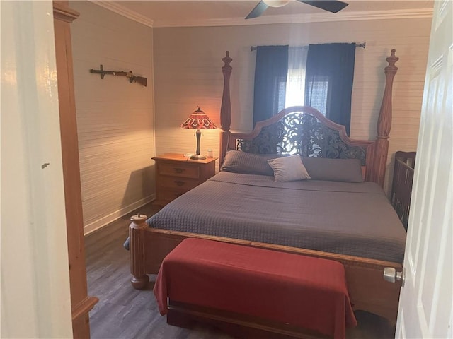 bedroom featuring crown molding, ceiling fan, and wood finished floors