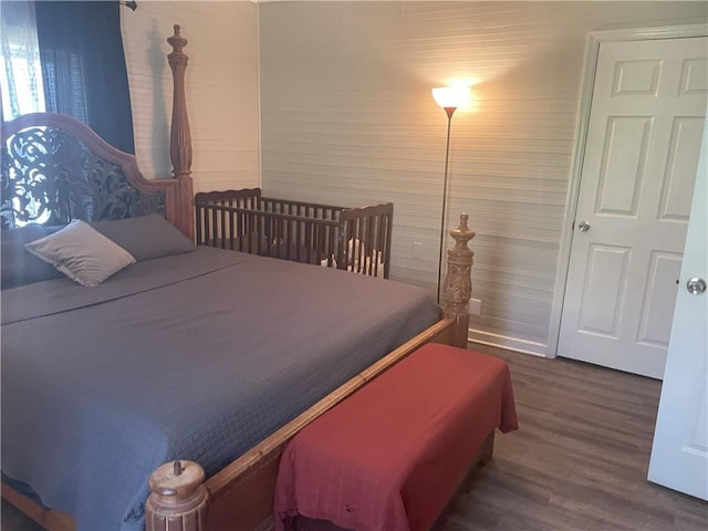 bedroom featuring wood finished floors