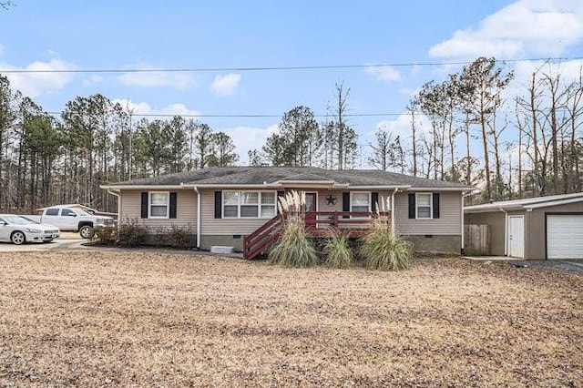 ranch-style home featuring a garage and crawl space