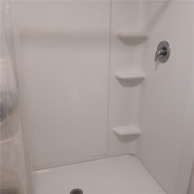 bathroom with walk in shower