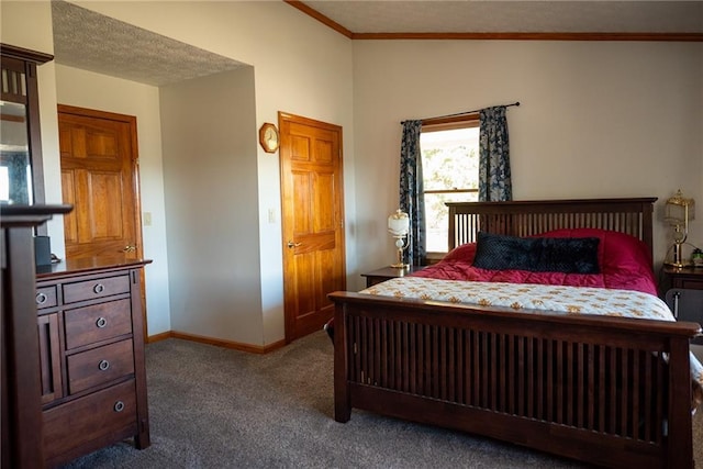 carpeted bedroom with a textured ceiling and ornamental molding