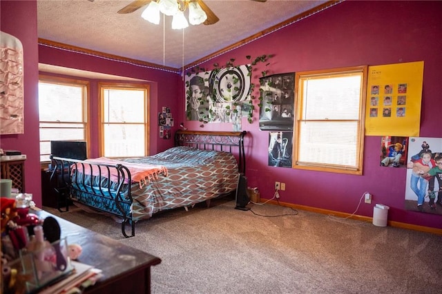 bedroom featuring vaulted ceiling, ceiling fan, ornamental molding, a textured ceiling, and carpet floors