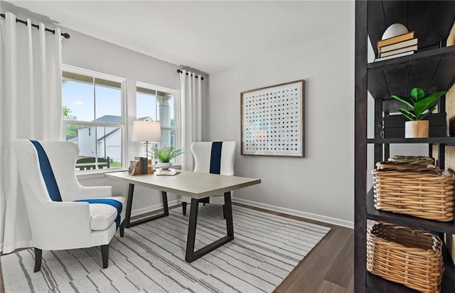 home office featuring hardwood / wood-style floors