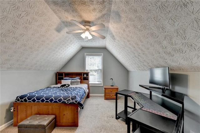 bedroom featuring lofted ceiling, carpet floors, and ceiling fan