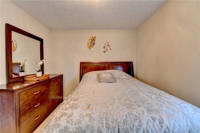 bedroom with a textured ceiling