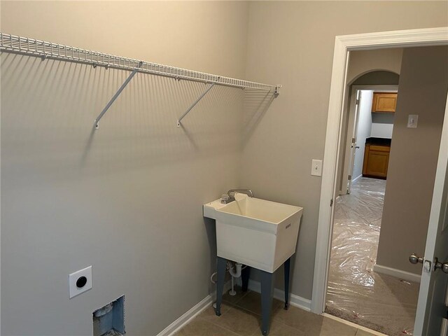 laundry room featuring hookup for an electric dryer