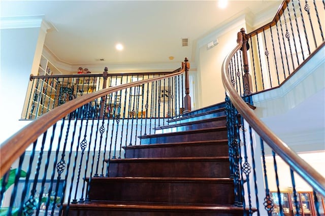 stairway featuring recessed lighting, visible vents, and crown molding