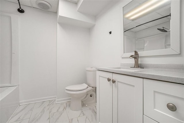 bathroom with toilet and vanity