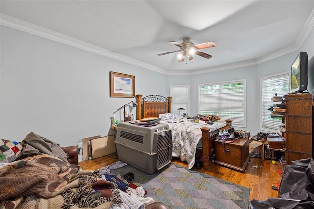 38 Olde Wick Trl, Hoschton, GA 30548 - bedroom with wood finished floors, crown molding, and ceiling fan