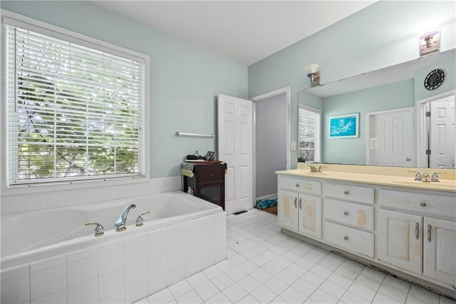 38 Olde Wick Trl, Hoschton, GA 30548 - bathroom with double vanity and a bath