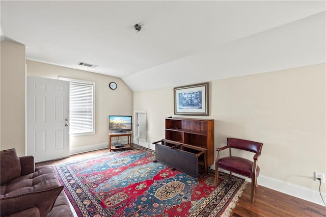 38 Olde Wick Trl, Hoschton, GA 30548 - sitting room with wood finished floors and vaulted ceiling