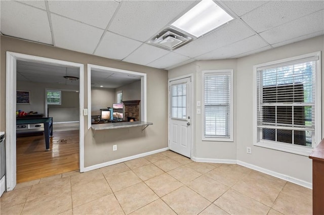 38 Olde Wick Trl, Hoschton, GA 30548 - doorway to outside featuring a paneled ceiling, light tile patterned flooring, and healthy amount of natural light