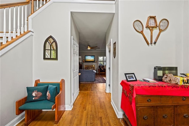 38 Olde Wick Trl, Hoschton, GA 30548 - hallway with wood finished floors and stairs