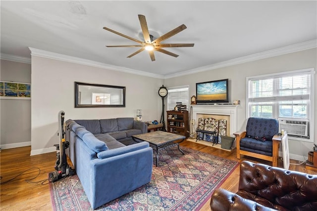 38 Olde Wick Trl, Hoschton, GA 30548 - living room featuring a ceiling fan, crown molding, cooling unit, and wood finished floors