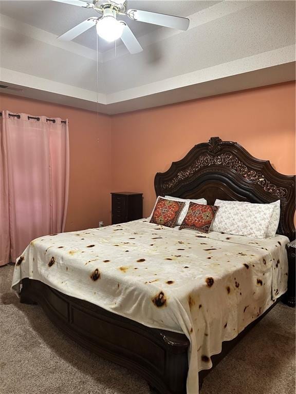 carpeted bedroom featuring a ceiling fan