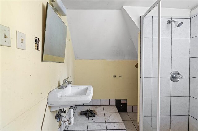 1225 Clifton Rd, Atlanta, GA 30307 - bathroom with tile patterned floors, sink, and tiled shower
