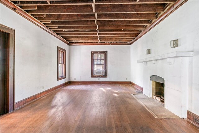 1225 Clifton Rd, Atlanta, GA 30307 - unfurnished living room featuring cooling unit and wood-type flooring