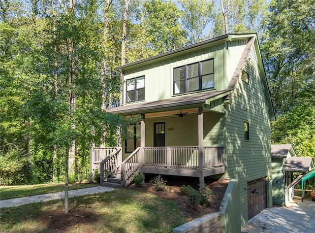 view of front of house featuring covered porch and a garage