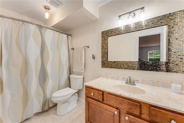 bathroom featuring tile patterned floors, decorative backsplash, vanity, and toilet