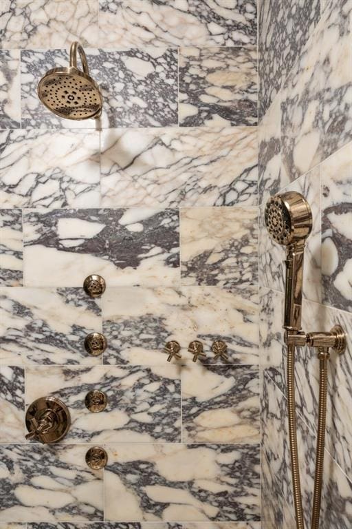 details featuring a tile shower