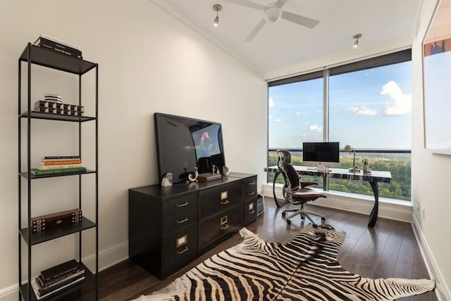 office with baseboards, a ceiling fan, and dark wood-style flooring