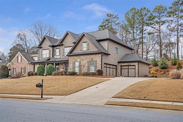 craftsman-style house with a garage and a front yard