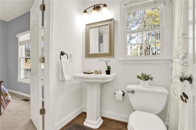 bathroom featuring toilet