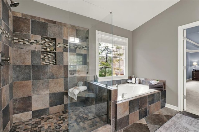 bathroom featuring separate shower and tub and lofted ceiling