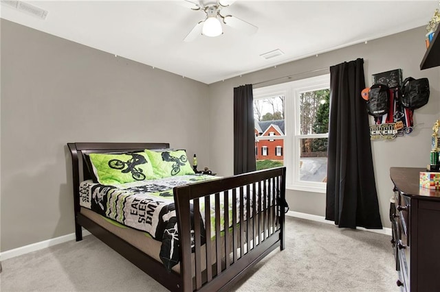 carpeted bedroom featuring ceiling fan