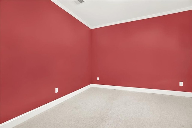 unfurnished room featuring carpet flooring and ornamental molding