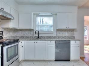 kitchen featuring white cabinets, tasteful backsplash, under cabinet range hood, and stainless steel appliances