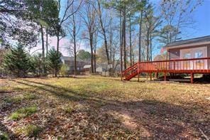 view of yard featuring a deck