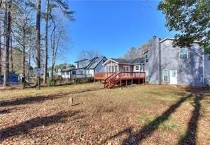 view of yard featuring a deck