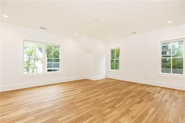 unfurnished room featuring light hardwood / wood-style flooring