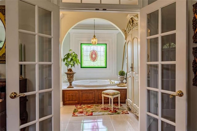 7174 Rockmart Rd, Silver Creek, GA 30173 - bathroom featuring french doors, a bath, and tile patterned floors