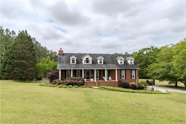 7174 Rockmart Rd, Silver Creek, GA 30173 - cape cod home with covered porch, brick siding, a chimney, and a front lawn