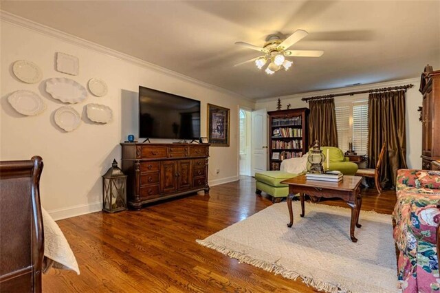 7174 Rockmart Rd, Silver Creek, GA 30173 - living room featuring a ceiling fan, ornamental molding, baseboards, and wood finished floors