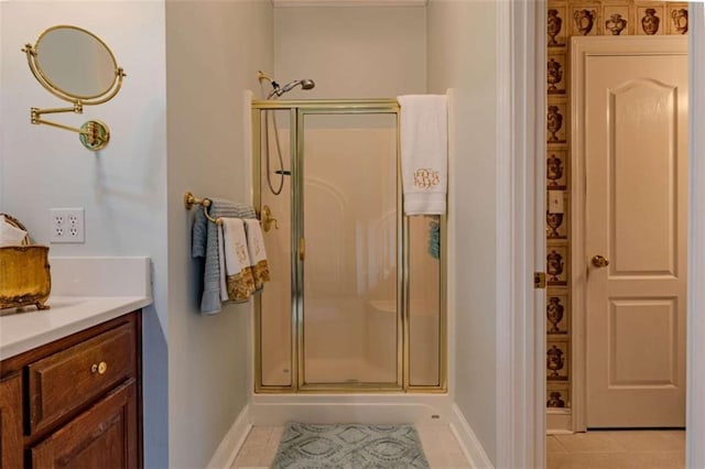 7174 Rockmart Rd, Silver Creek, GA 30173 - bathroom with tile patterned floors, vanity, baseboards, and a stall shower