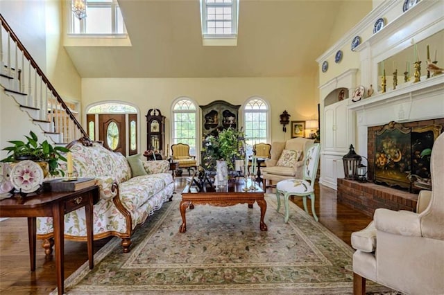 7174 Rockmart Rd, Silver Creek, GA 30173 - living area featuring stairs, high vaulted ceiling, and wood finished floors
