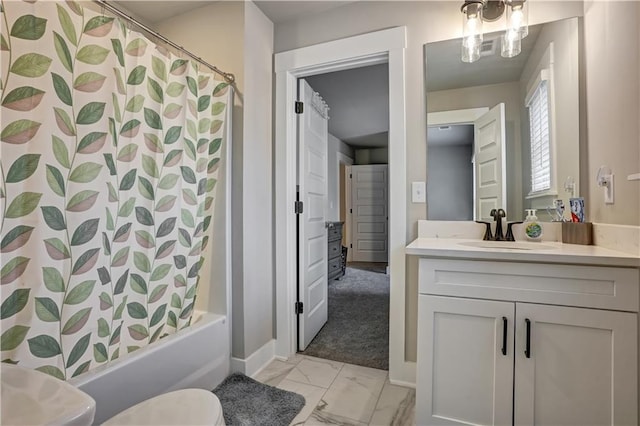 full bathroom featuring shower / bath combo with shower curtain, vanity, and toilet