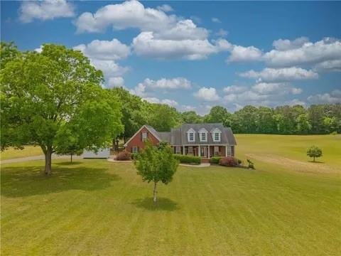 view of front of home with a front lawn