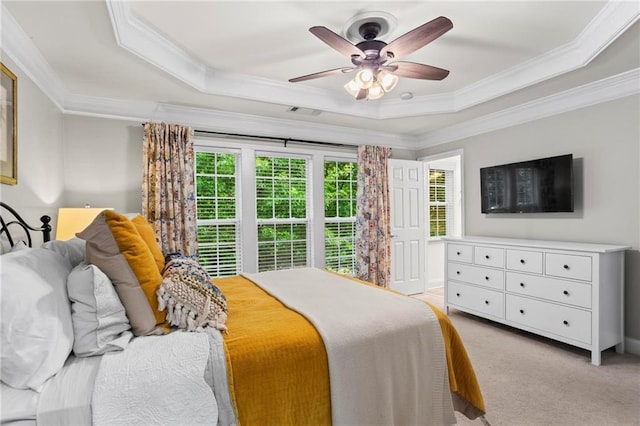 2343 Limehurst Dr NE, Atlanta, GA 30319 - bedroom featuring crown molding, a tray ceiling, light colored carpet, and a ceiling fan